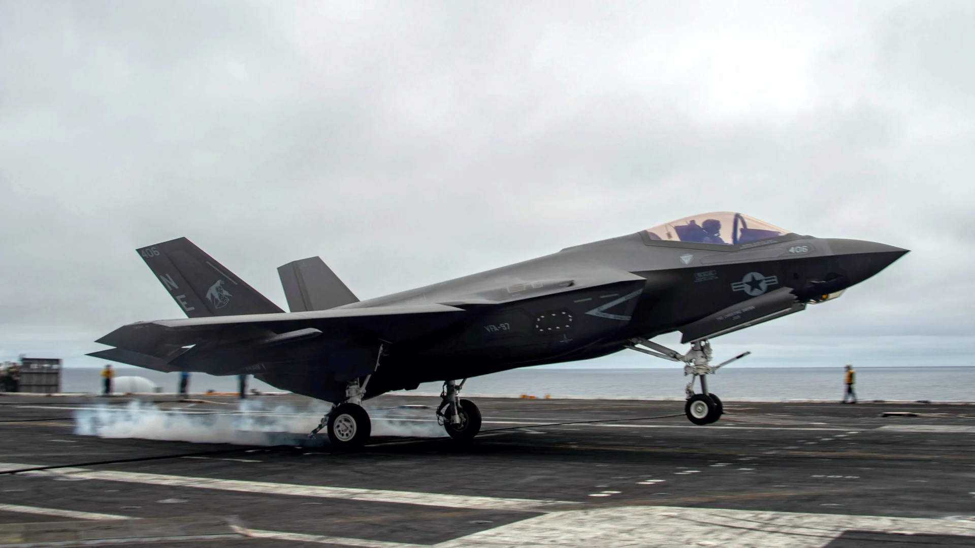 An F-35C landing on the deck of USS Nimitz in the Pacific Ocean
